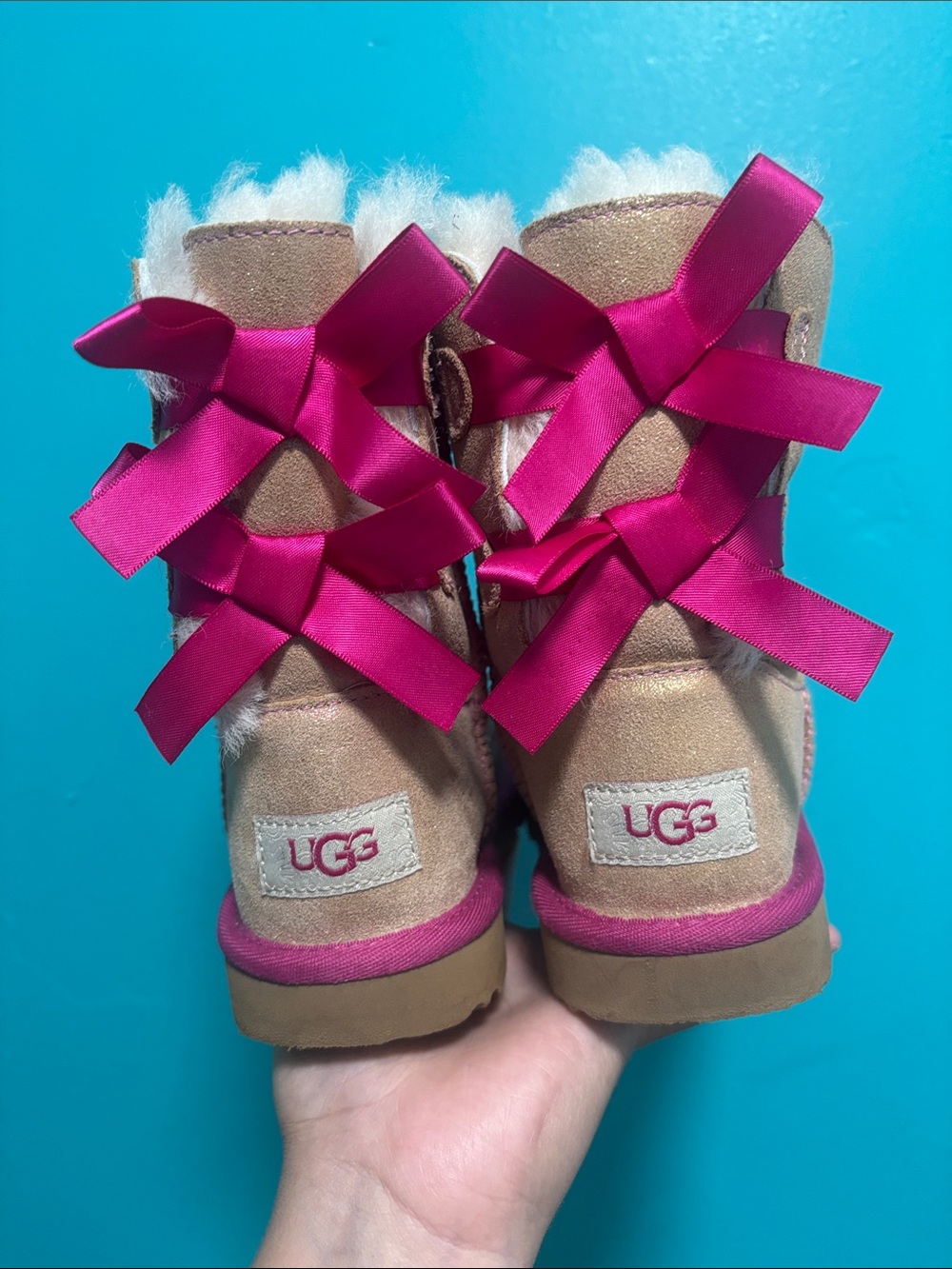 UGG Kids Tan Suede Boots with Pink Accents and Bows - Picture 2 of 8
